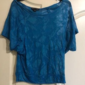 Off the shoulder slightly sheer top